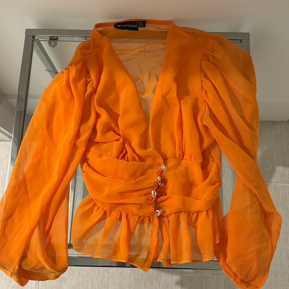 orange cropped blouse